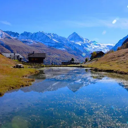 Idyllic In Evolene, With View On The Dent Blanche And The Mountains Evolène